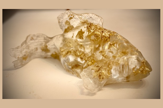 Gold-flake resin fish sculpture